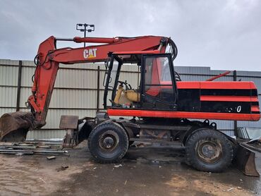 шины на степвагон: Экскаватор, Caterpillar, Дөңгөлөктүү