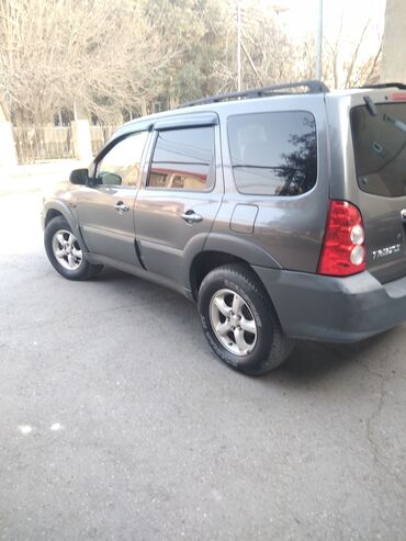 Mazda: Mazda Tribute: 2.3 l | 2004 il Ofrouder/SUV — 4