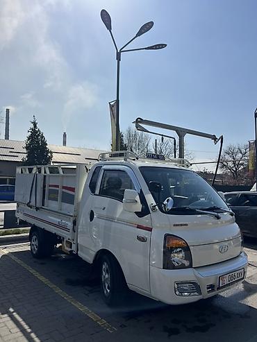 kiya bongo: Hyundai Porter II (бортовой малотоннажный грузовик) - Компактный — 4