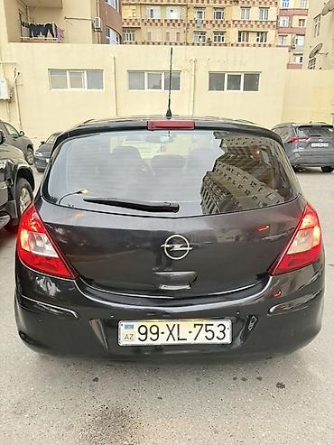 bot kar: Opel Corsa D, hetçbek kuzov, 5 qapı, qara rəng. Əsas xüsusiyyətlər: - — 2
