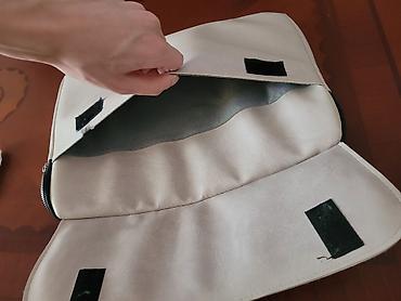 china aid notebook: Krem rəngli macbook çantası
Zərbədən qoruyan içlik
2 cib — 2