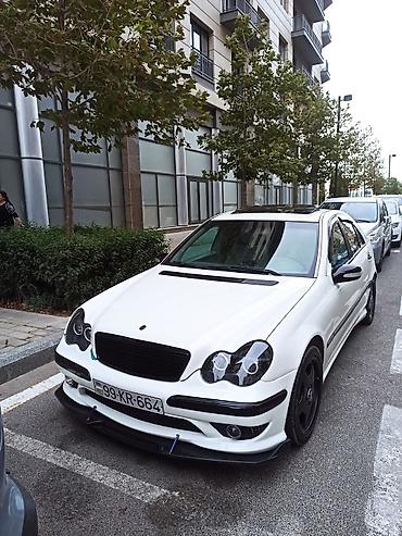 lexus 2018 qiymeti: Ağ rəngdə sedan, idman üslubunda eksteryer paketli. - Ön bamperdə — 7