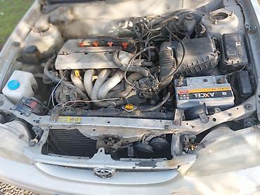 işləmiş təkər: Toyota Corolla: 1.8 l | 2000 il Sedan — 6