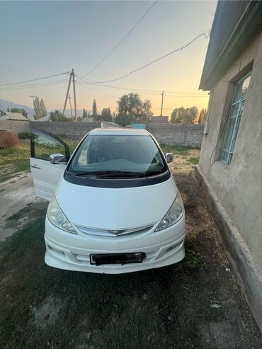 эвакуатор чолпон ата: Белый минивэн Toyota Estima с плавными линиями кузова и спортивным