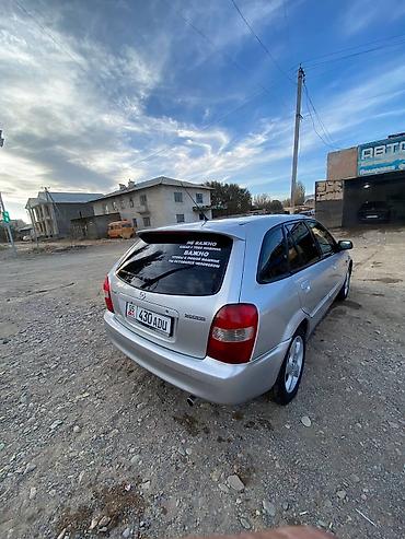 передвижные дома: Mazda Familia: 2001 г., Бензин, Хэтчбэк — 1