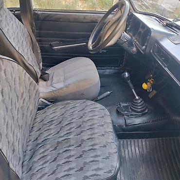 2104 baqaj: Lada 2104 universal, ağ rəng. - Kuzov: 5 qapılı universal gövdə, iri — 5