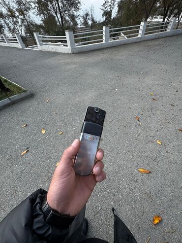 Nokia: Nokia 1, rəng - Gümüşü, Düyməli — 9