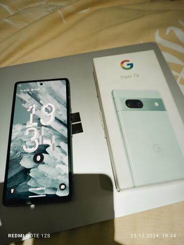 Google: Google Pixel 7a, Б/у, 128 ГБ, цвет - Голубой, 2 SIM