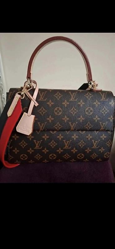 naik original: Elegantna ženska torba sa monogram šarom u braon tonovima. Model sa — 1