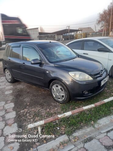 Mazda: Mazda Demio: 2005 г., 1.4 л, Автомат, Бензин