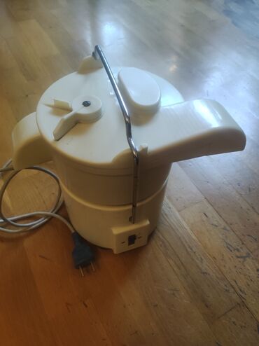 Digər əntiq əşyalar: Qədimi sivetdən qalma daş tərəzi. Qədimi şirəcəkən maşın — 9