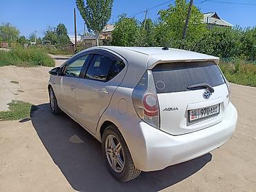 эстимо: Toyota Aqua: 2013 г., 1.5 л, Автомат, Гибрид, Хэтчбэк — 2