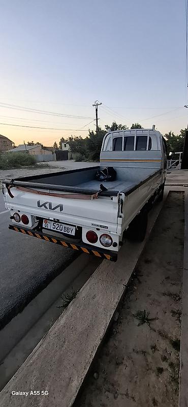 mitsubishi toppo: Kia Bongo III (K2500/K2700) бортовой малотоннажный грузовик, левый — 4