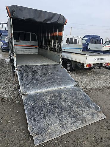sprinter 2 2: Заказать Hyundai Porter II тентованный Перевозка с Мебели и т Такси — 1