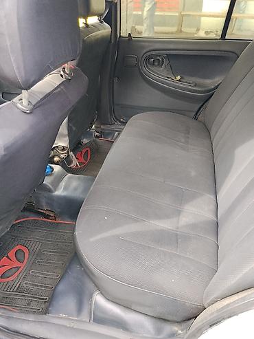 Daewoo: Daewoo Nexia: 1.5 l | 2007 il Sedan — 15