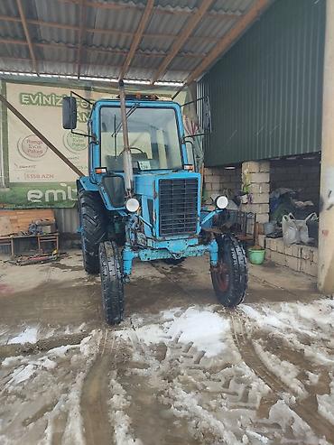 Traktorlar: Mavi rəngli tək kabinalı təkərli traktor.ili 1992 tam zavodu Texniki — 5