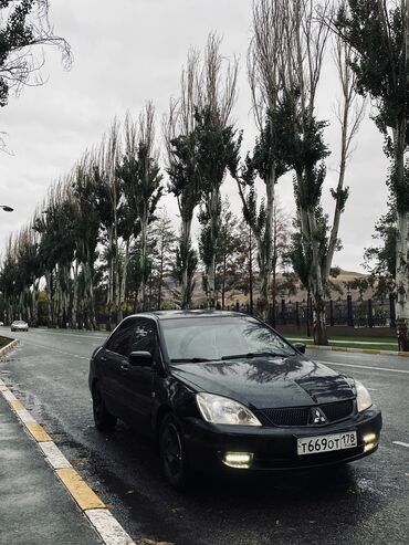 Mitsubishi: Mitsubishi Lancer: 2005 г., 1.6 л, Механика, Бензин, Седан