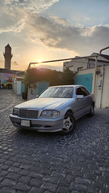 Cadillac: Mercedes-Benz C 240: 2.4 л | 1997 г. Седан
