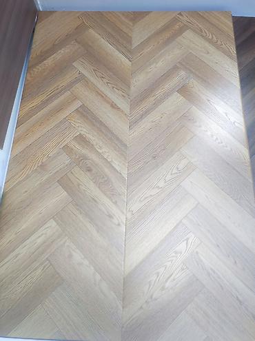 balaca yolkalar: Herringbone (balıqquyruğu) naxışlı döşəmə örtüyü - Material: laminat — 1
