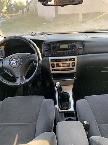 Toyota: Toyota Corolla: 2004 г., 1.6 л, Кол менен иштөөчү, Бензин, Универсал — 7