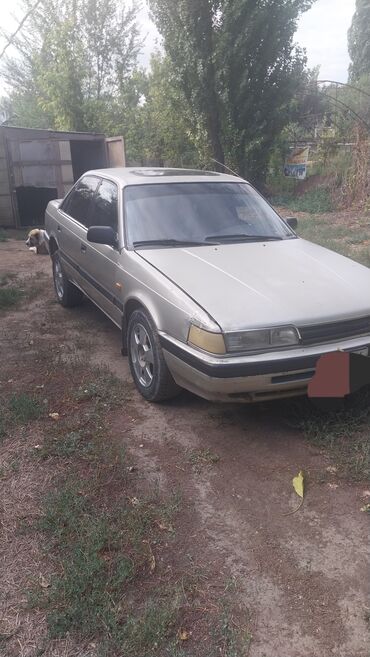 домкрат 124: Mazda 626: 1989 г., 2 л, Механика, Бензин, Седан