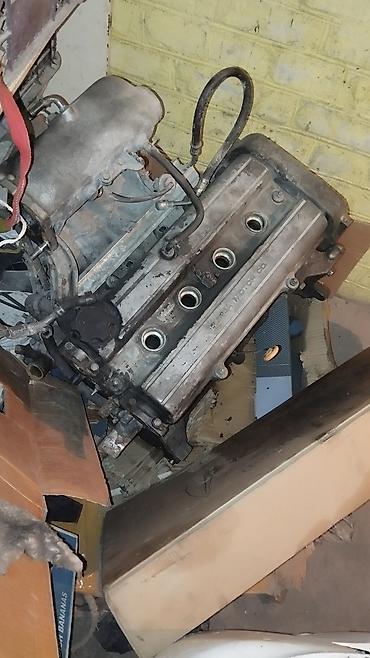 e klass: Двигатель Honda 2.0 DOHC, рядный 4‑цилиндровый (без VTEC). На крышке — 2
