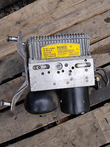 Блок ABS/ASC+T Bosch с гидроаккумулятором и электрогидравлическим at lalafo.kg Блок ABS/ASC+T Bosch с гидроаккумулятором и электрогидравлическим
