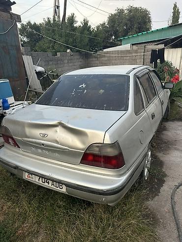 запчасти rexton: Daewoo Nexia, серебристый седан. Основные особенности: - Кузов — 3