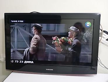 samsung 15: Телевизор Samsung с плоским экраном, диагональ примерно 32–37" — 1