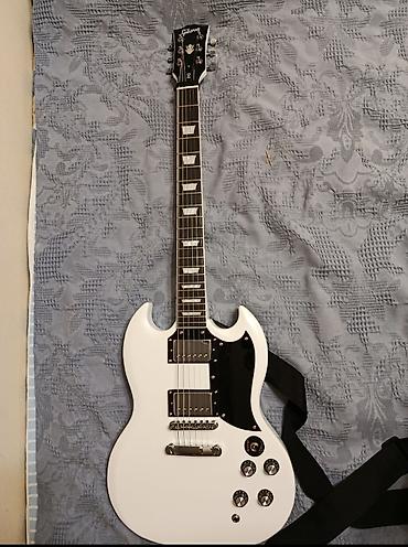 Гитары: Электрогитара gibson sg в белом цвете.Гитара полностью отстроенна — 3