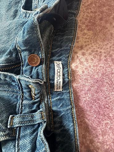 Şortlar: Məhsul: Uşaq denim şortu Brend: DeFacto Ölçü: 10 (etiketdə: Size — 1