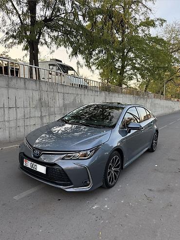 Toyota: Toyota Corolla: 2023 г., 1.8 л, Вариатор, Гибрид, Седан — 1