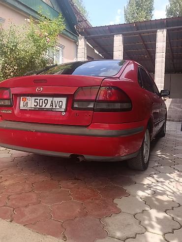 Транспорт: Mazda 626: 1998 г., 2 л, Механика, Бензин, Хэтчбэк — 4
