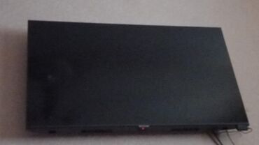 24 ekran smart tv: 109 ekran yutubu netfilks fileşkart yeri arxasını divara asilan