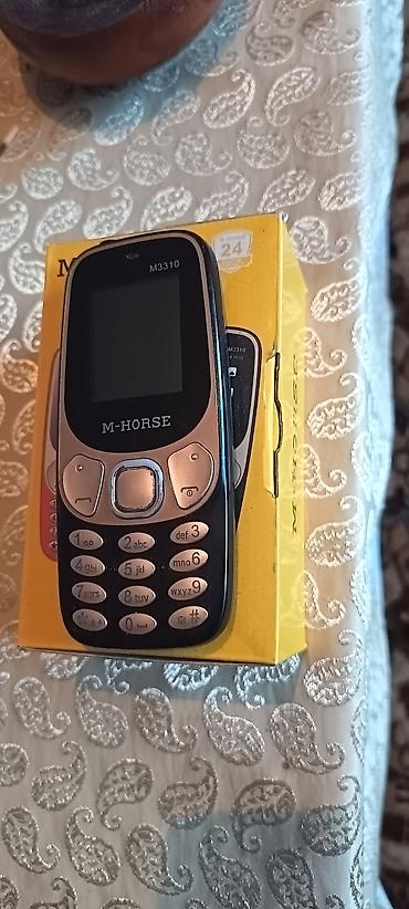 memory stick: M-HORSE M3310 düyməli mobil telefon Xüsusiyyətlər: - Kompakt korpus — 1