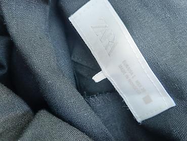 nike react patike: Elegantna crna haljina sa halter izrezom - Duga, uska silueta koja — 5