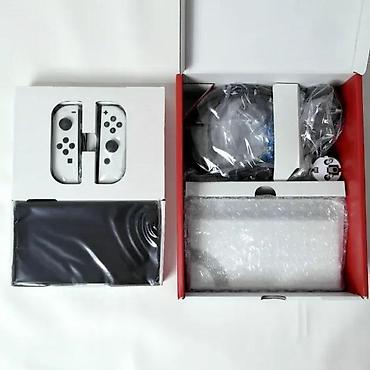 uticnica za ta pec: Uz konzolu dolazi: Tablet (konzola) Dock (postolje za TV) Joy-Con — 5