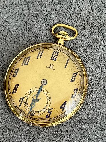 omega: Omega cib saatı – mexaniki, qurmalı - Brend və model: Omega (lövhədə — 1