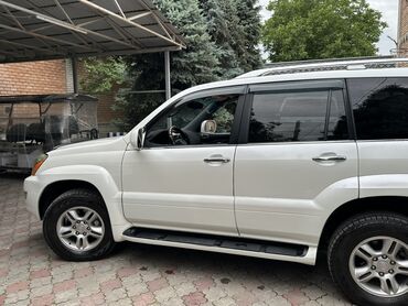 pontiac aztec: Внедорожник Lexus GX, выполненный в белом цвете, с рейлингами на крыше