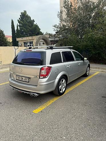 avtomobil apteçkası: Opel Astra: 1.3 l | 2008 il 306890 km Universal — 10