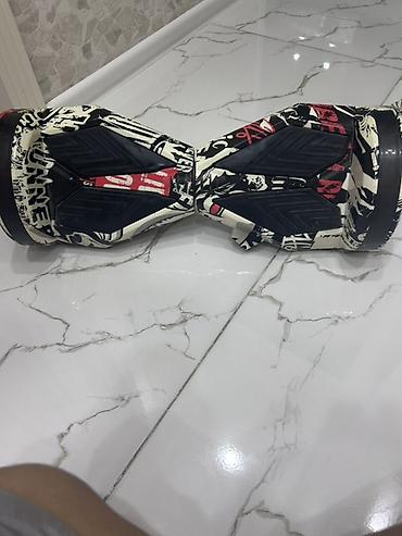 Электротранспорт: Qrafiti dizaynlı balans skuter (hoverboard) - 6.5" təkərlər, yanlarda — 2