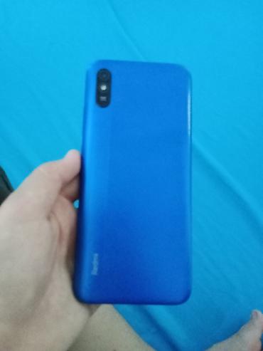 Redmi, Redmi 9A, Б/у, 64 ГБ, цвет - Голубой, 1 SIM, 2 SIM — 1