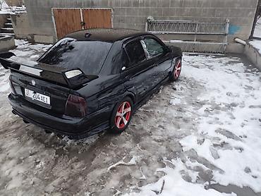 Mazda: Mazda Protege: 2001 г., 2 л, Автомат — 11