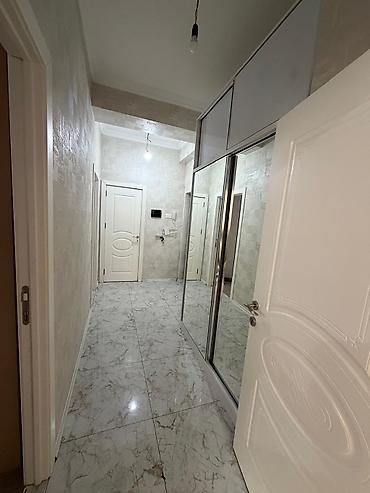 9 mkr: 3 otaqlı, Yeni tikili, 69 kv. m — 4