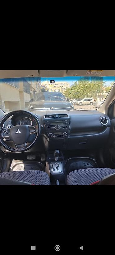 isma mirage: Mitsubishi Attrage sedan - Kuzov: 4 qapılı sedan, tünd boz rəng - — 3