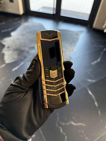 silver et ceken: Vertu 4 GB, rəng - Qızılı, Düyməli — 4