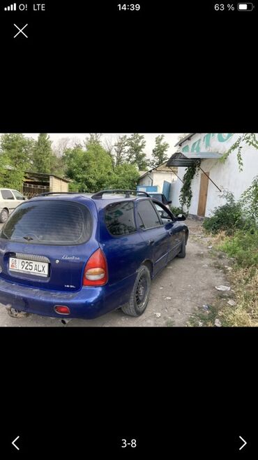 электирик машина: Автомобиль Hyundai Elantra в кузове универсал синего цвета. На крыше