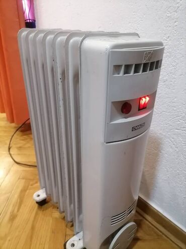 lampa i gelovi za nokte: Radijator uljni OMAS 1500 W 7 rebara na točkiće 
 Mirjevo