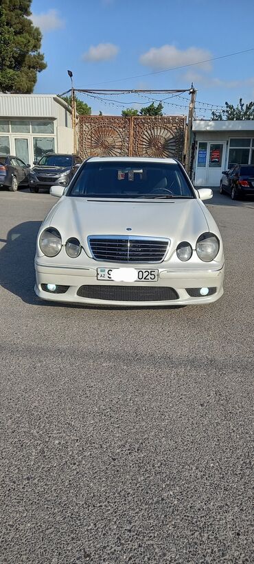 qaz 13: Mercedes-Benz E 240: 1.7 l | 1999 il Sedan