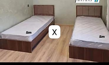 İki ədəd tək nəfərlik çarpayı komplekti. - Material: taxta karkas